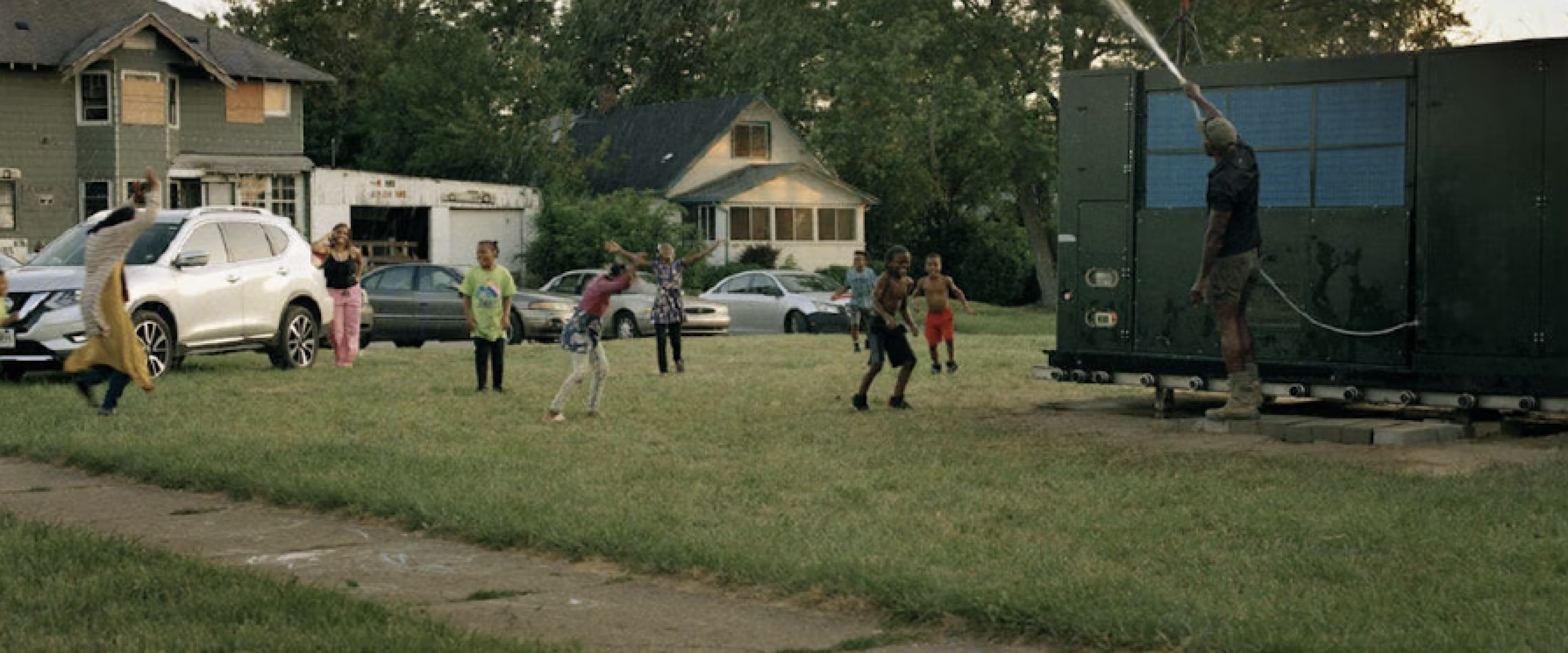 Photo of kids in the yard playing
