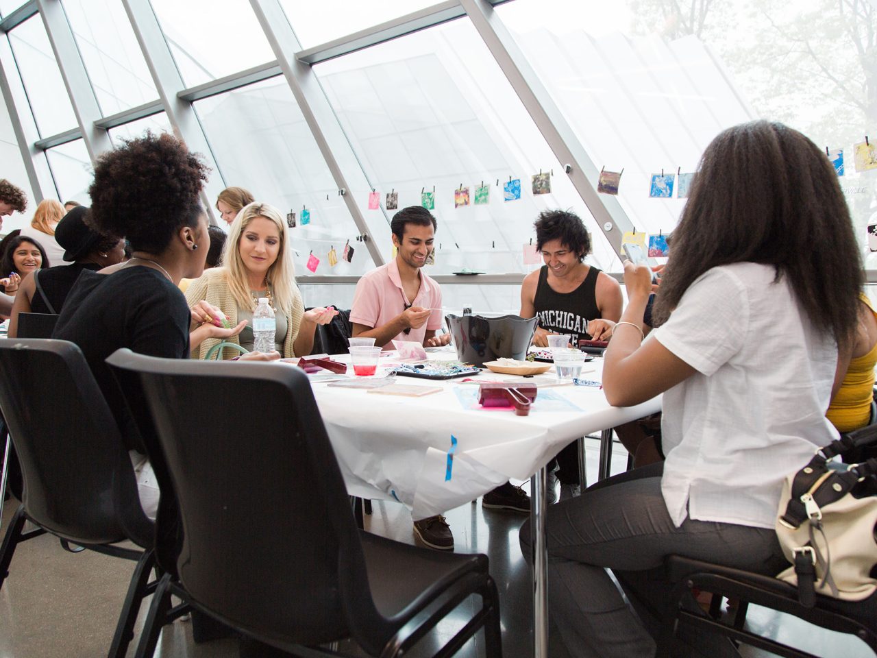 Students together around table