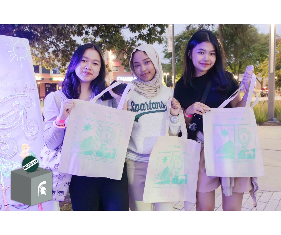 girls holding tote bags