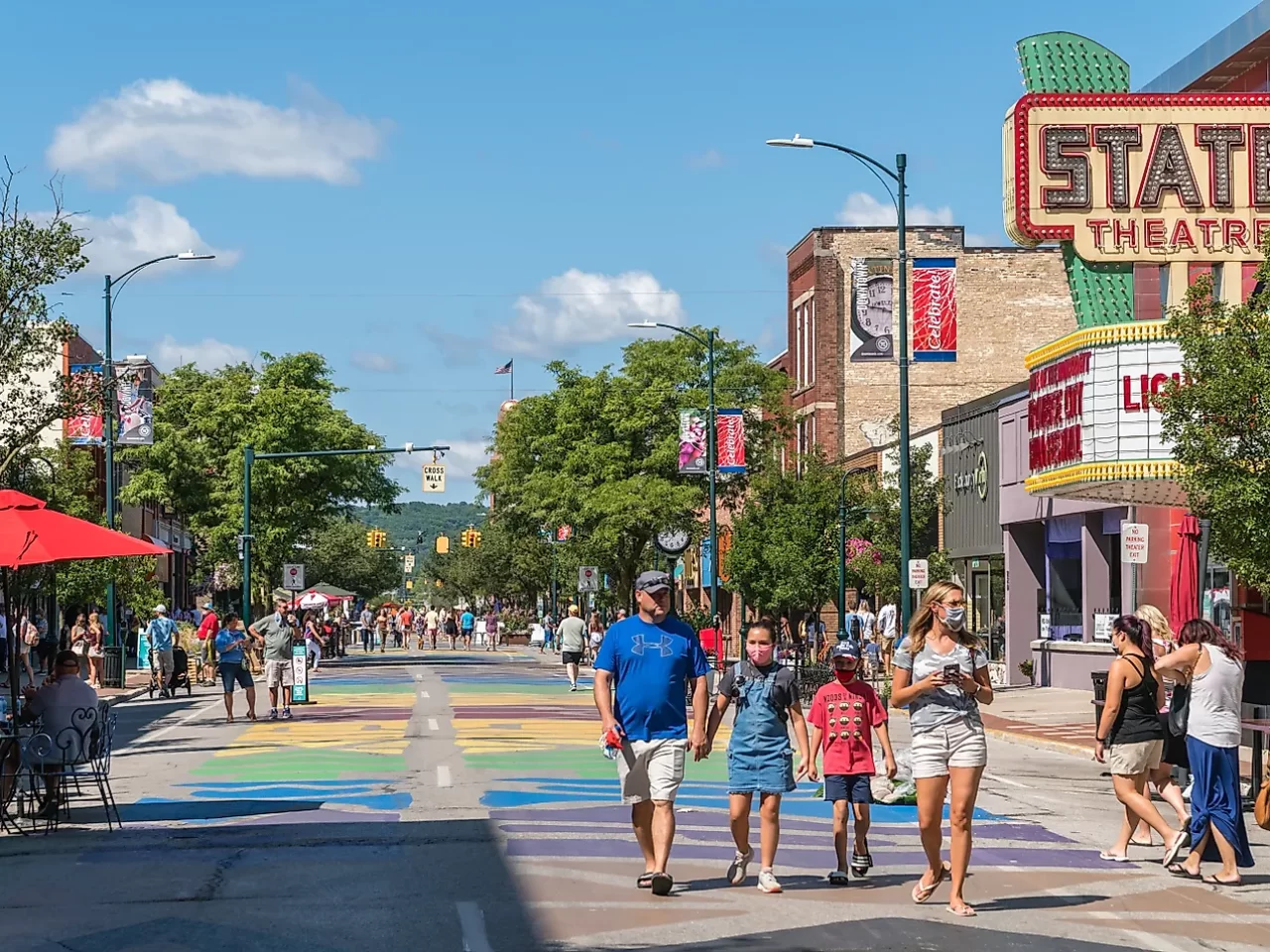 family walking in a small city